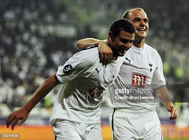 Hossam Ghaly of Tottenham Hotspur celebrates scoring with team mate Danny Murphy during the UEFA Cup Group B match between Besiktas and Tottenham...