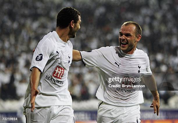 Hossam Ghaly of Tottenham Hotspur celebrates scoring with team mate Danny Murphy during the UEFA Cup Group B match between Besiktas and Tottenham...