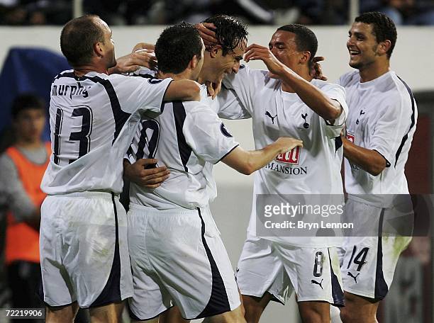 Dimitri Berbatov of Tottenham Hortspur celebrates with his team after scoring during the UEFA Cup Group B match between Besiktas and Tottenham...