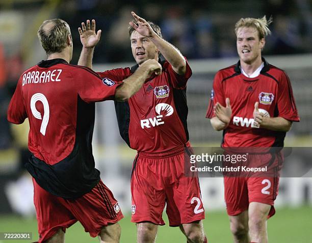 Bernd Schneider of Leverkusen celebrates his first goal with Sergej Barbarez during the UEFA Cup group B match between Club Brugge and Bayer...