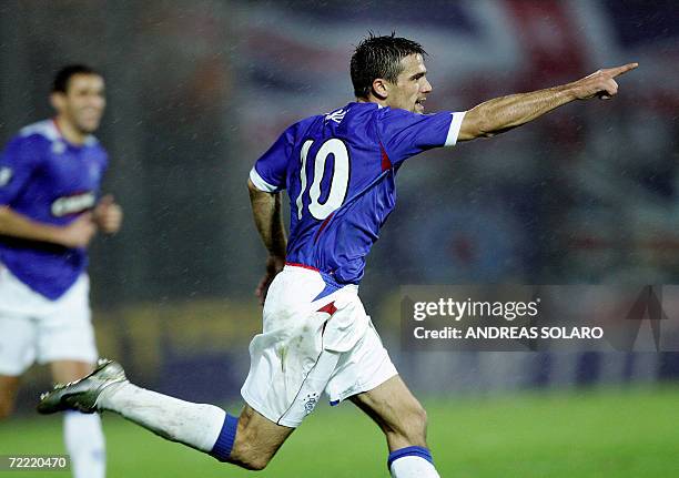 Glasgow Rangers's Spanish midfielder Nacho Novo celebrates after scoring against AS Livorno during their UEFA football match, 19 October 2006 at...