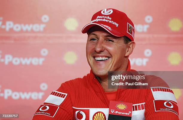 Michael Schumacher of Germany and Ferrari talks to the media during a Shell Press Conference at the Transamerica Hotel during the previews to the...