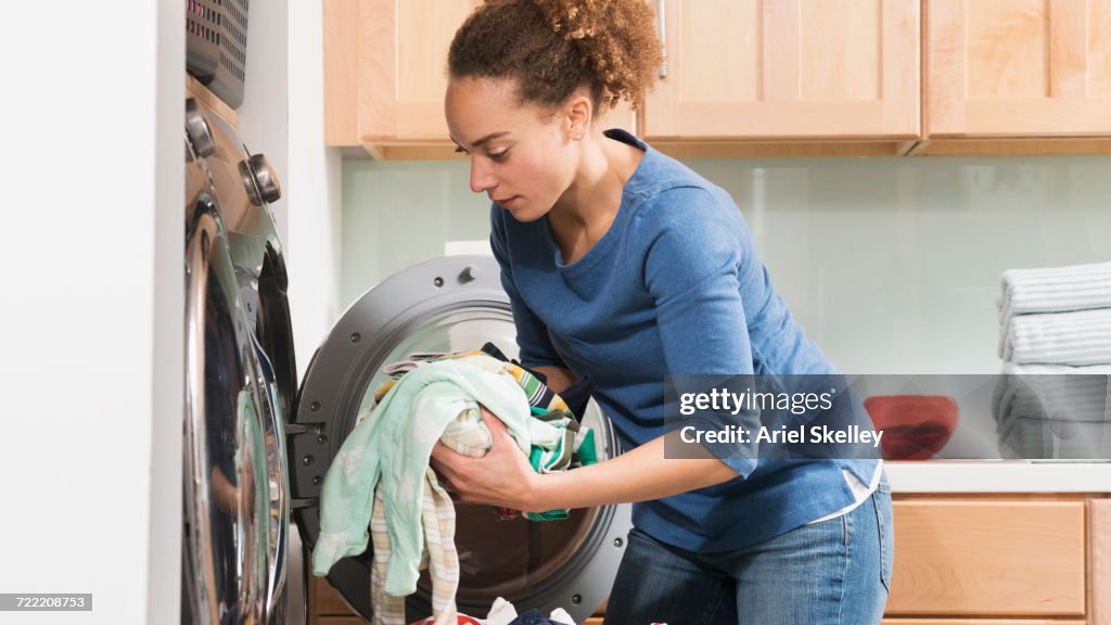 Black woman doing laundry
