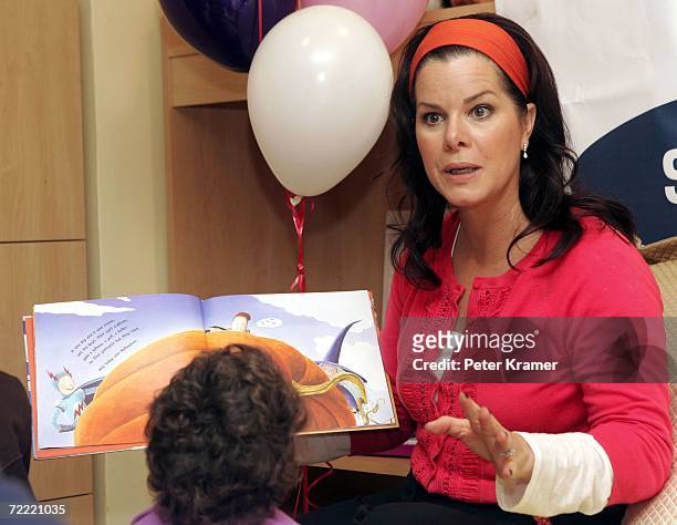 Actress Marcia Gay Harden reads a book to kids at The Ronald McDonald House of New York where they celebrated the auctioning of 25 Sleep Number beds...