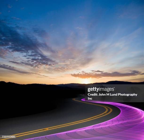 purple data waves flowing on information superhighway at sunset - 情報スーパーハイウェイ ストックフォトと画像