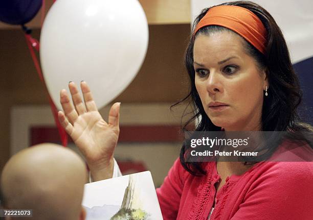 Actress Marcia Gay Harden reads a book to kids at The Ronald McDonald House of New York where they celebrated the auctioning of 25 Sleep Number beds...