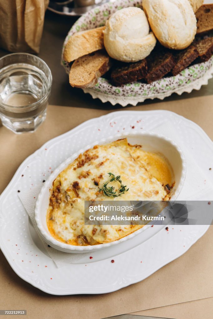 Baked lasagna and bread