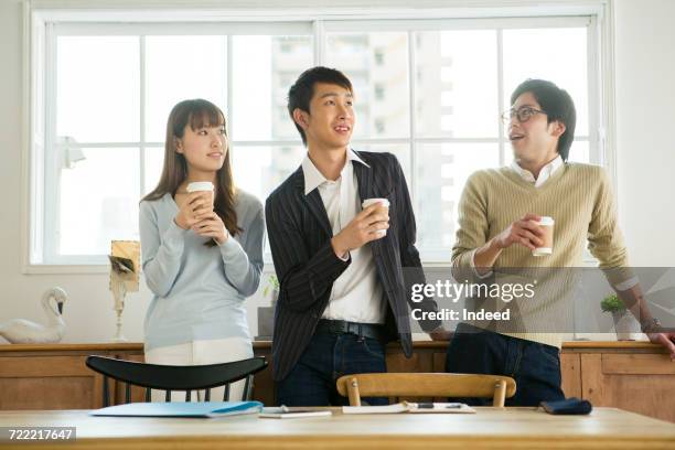 businessmen and woman having coffee break - coffee break office ストックフォトと画像