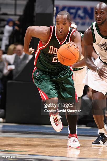 Michael Redd of the Milwaukee Bucks drives up court during a preseason game against the Minnesota Timberwolves at the Target Center on October 11,...