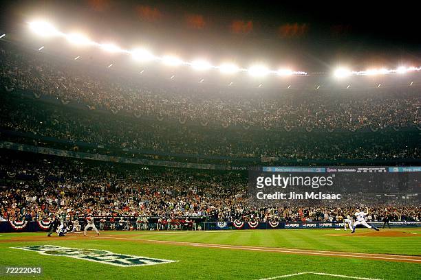 Oliver Perez of the New York Mets pitches to David Eckstein of the St. Louis Cardinals during game seven of the NLCS at Shea Stadium on October 19,...