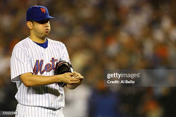 Oliver Perez of the New York Mets reacts during their game against the St. Louis Cardinals during game seven of the NLCS at Shea Stadium on October...