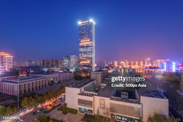 illuminated city at dusk, shijiazhuang, hebei, china - província de hebei - fotografias e filmes do acervo
