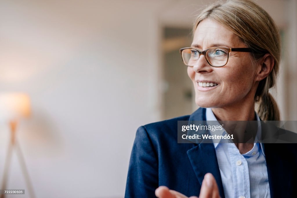 Portrait of confident businesswoman wearing glasses