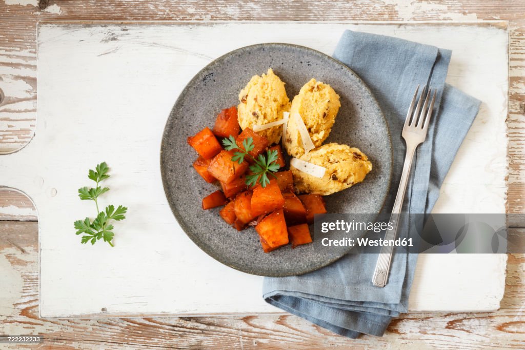 Braised root vegetables with boletus polenta