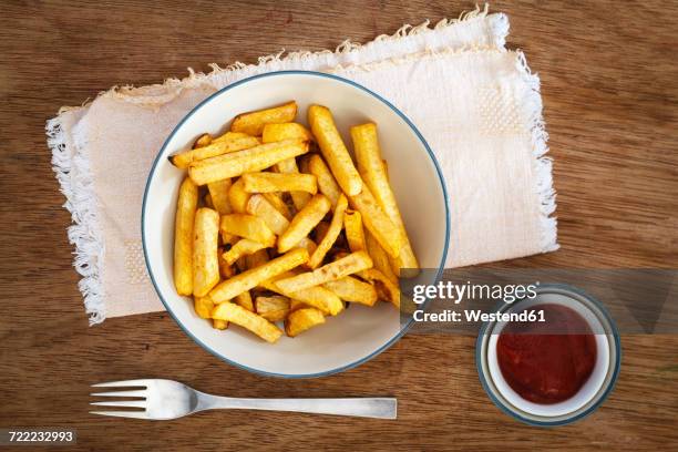 bowl of swede fries and bowl of ketchup - batata frita - fotografias e filmes do acervo