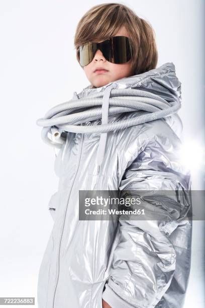 portrait of a cool boy wearing sunglasses and fancy dress - big hero 6 film stock-fotos und bilder