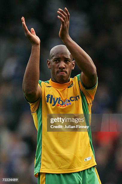 Dion Dublin of Norwich City applauds the travelling fans after the Coca-Cola Championship match between Queens Park Rangers and Norwich City at...
