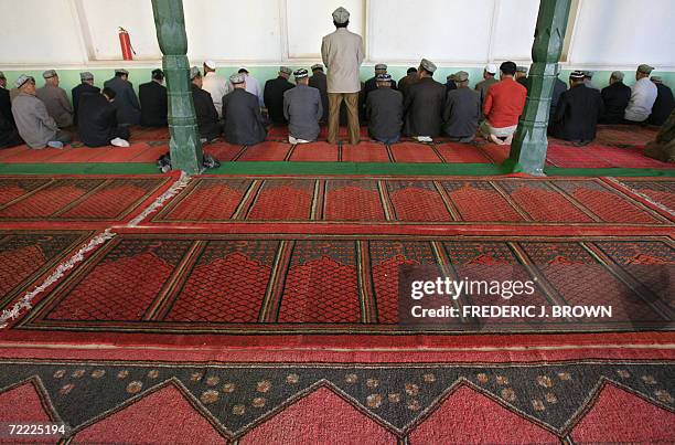 Worshippers pray at the Idkah Mosque in Kashgar, 15 October 2006, in China's far west Xinjiang Uighur Autonomous Region in Central Asia. Known as...
