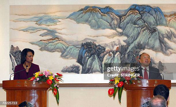 Secretary of State Condoleezza Rice and Chinese Foreign Minister Li Zaoxing attend a joint press conference after their talks at the Diaoyutai Guest...