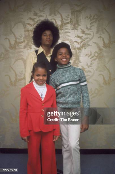 Portrait of American musical siblings Michael , Janet, and Randy Jackson at the Warwick Hotel, New York, New York, 1974.