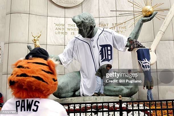 The Detroit Tigers mascot, watches the Spirit of Detroit statue get dressed in a giant Detroit Tigers jersey October 20, 2006 in Detroit, Michigan....