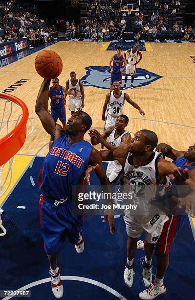Ronald Dupree of the Detroit Pistons rebounds against the Memphis Grizzlies during a preseason game on October 14, 2006 at FedExForum in Memphis,...