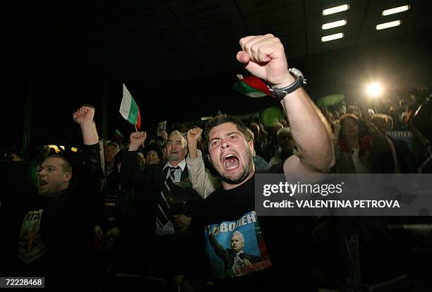 Supporters of ultra nationalist presidential candidate Volen Siderov shouts slogans during the final meeting of his pre-election campaign in Sofia,...