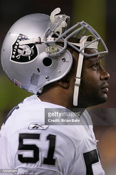 Defensive end Lance Johnstone of the Oakland Raiders looks on against the Denver Broncos on October 15, 2006 at Invesco Field at Mile High in Denver,...