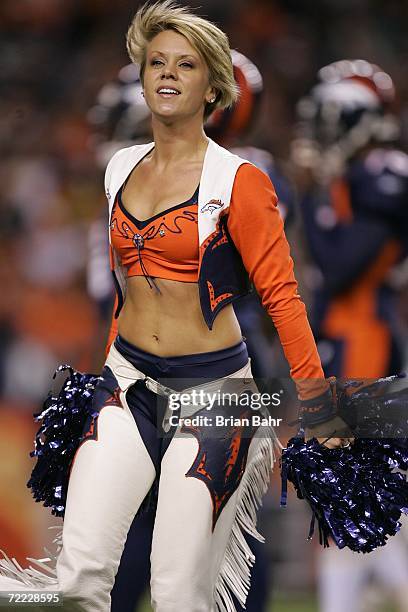 Denver Broncos cheerleader performs during the game against the Oakland Raiders on October 15, 2006 at Invesco Field at Mile High in Denver,...