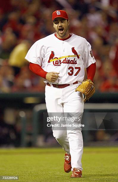 Pitcher Jeff Suppan of the St. Louis Cardinals jogs off the mound during against the New York Mets in game three of the NLCS at Busch Stadium on...