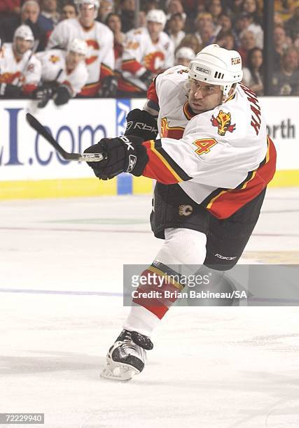 Roman Hamrlik of the Calgary Flames takes a slapshot against the Boston Bruins at the TD Banknorth Garden on October 19, 2006 in Boston,...