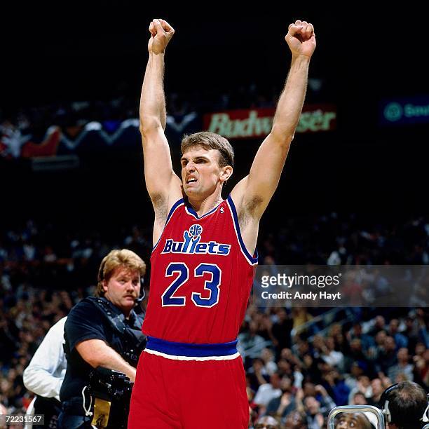 Tim Legler of the Washington Bullets celebrates with his hands in the air during the 1996 AT&T Three Point Shootout on February 10, 1996 at the...