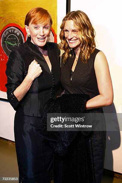 Kathy Eldon and actress Julia Roberts pose for a photo during the Dan Eldon Photo Exhibit at The Xchange on October 20, 2006 in New York City.