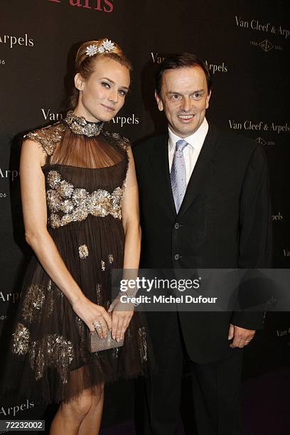 Actress Diane Kruger with Chairman of Van Cleef & Arpels, Stanislas de Quercize, attend the Van Cleef and Arpels party at the Tuileries Gardens...