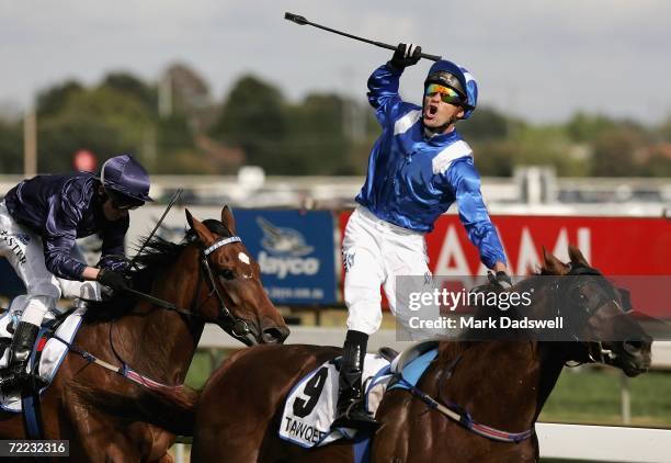 Jockey Dwayne Dunn riding Tawqeet celebrates his win in the BMW Caulfield Cup during the Caufield Cup Day meeting at Caulfield Racecouse on October...