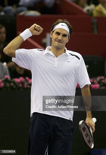 Roger Federer of Switzerland celebrates winning at match point in his match against David Nalbandian of Argentina in the semi finals during day six...