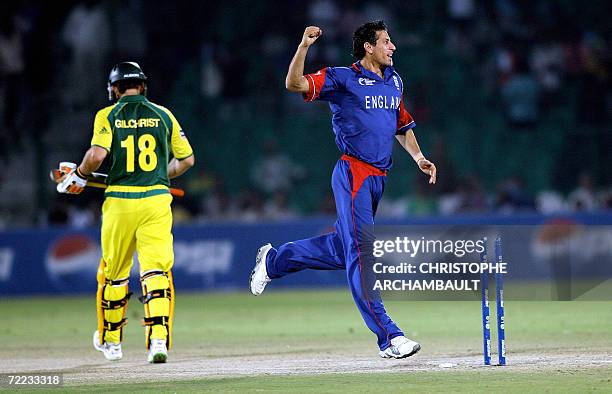 England cricketer Sajid Mahmood leaps into the air after he dismissed Australia batsman Adam Gilchrist during an ICC Champions Trophy 2006 match at...