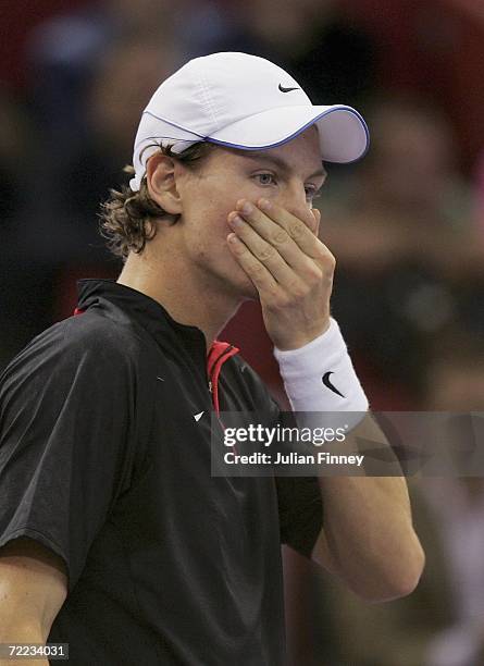 Tomas Berdych of Czech Republic looks on as he receives a hostile reception from the crowd in his match against Fernando Gonzalez of Chile in the...