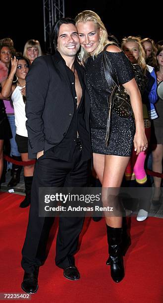 Singer Sarah Connor and her husband Marc Terenzi arrive at the 50th Anniversary of Bravo Magazine at the Color Line Arena on October 21, 2006 in...