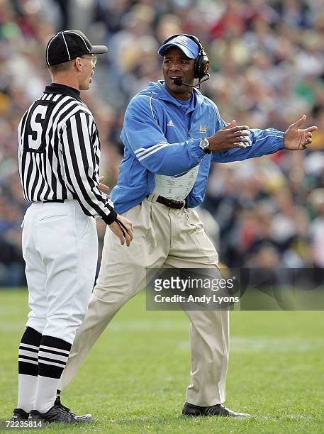 Karl Dorrell, the Head Coach of UCLA Bruins, argues his point with an offical during the game against Notre Dame Fighting Irish at Notre Dame Stadium...