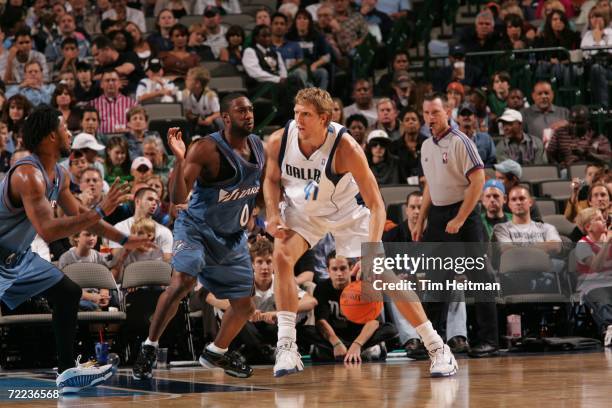 Dirk Nowitzki of the Dallas Mavericks drives the ball against Gilbert Arenas of the Washington Wizards on October 21, 2006 at the American Airlines...