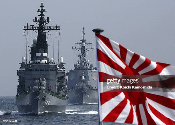 Ship of the Japanese Maritime Self-Defense Force sails in formation during a naval fleet review exercises on October 22, 2006 off Sagami Bay, Japan....