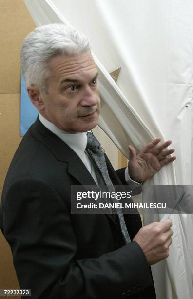 Bulgarian Presidential candidate Volen Siderov leaves a polling booth, in Sofia, 22 October 2006. Bulgaria's president is elected for a five-year...