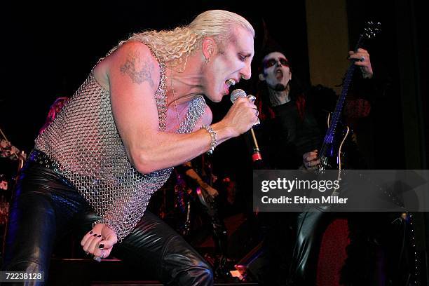 Twisted Sister singer Dee Snider and guitarist Zak Soulam perform as part of Snider and his wife Suzette's wedding vow renewal ceremony following a...