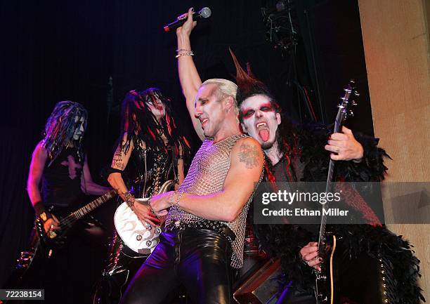 Bassist Derk Tailor Becraft, guitarist Denny Colt, Twisted Sister singer Dee Snider and guitarist Zak Soulam, perform as part of Snider and his wife...