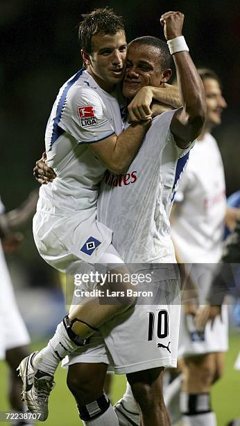 Rafael van der Vaart of Hamburg celebrates with teammate Vincent Kompany after winning the Bundesliga match between Bayer Leverkusen and Hamburger SV...