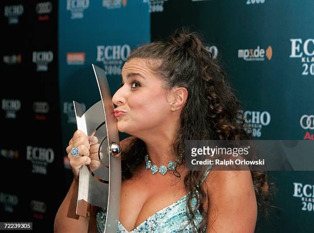Opera singer Cecilia Bartoli kisses the trophy of the Echo Klassik Award 2006 on October 22, 2006 in Munich, Germany. Bartoli received the music...