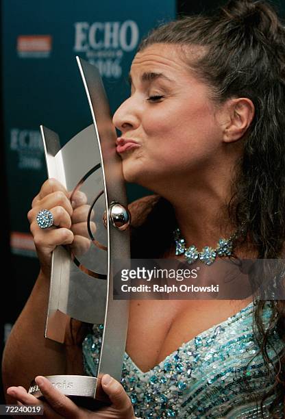 Opera singer Cecilia Bartoli kisses her trophy of the Echo Klassik Award 2006 on October 22, 2006 in Munich, Germany.