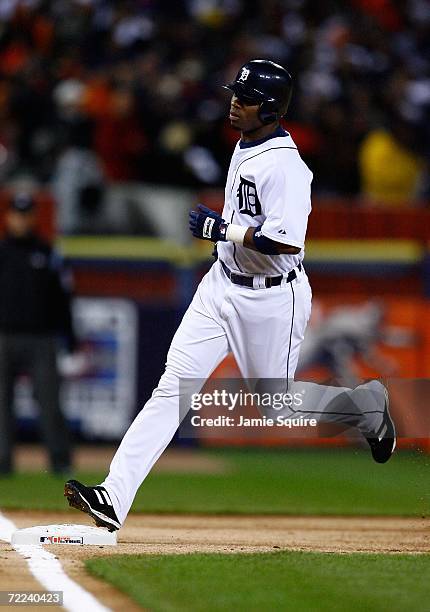 Craig Monroe of the Detroit Tigers rounds third on his solo home run in the bottom of the first inning against Jeff Weaver of the St. Louis Cardinals...