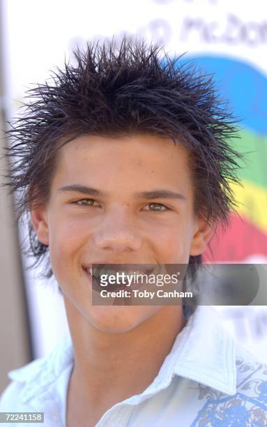 Taylor Lautner poses for a picture at the Camp Ronald McDonald for kids 14th Annual Family Halloween Carnival held at Universal Studios October 22,...